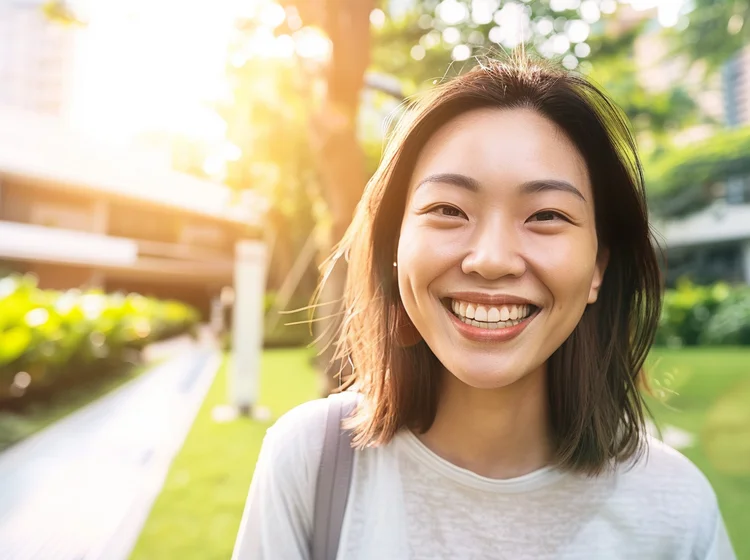 The main difference between the two types of veneers comes down to appearance, durability, stain resistance, cost, application time, and the extent of tooth alteration.